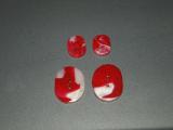 Red and white oval buttons.
